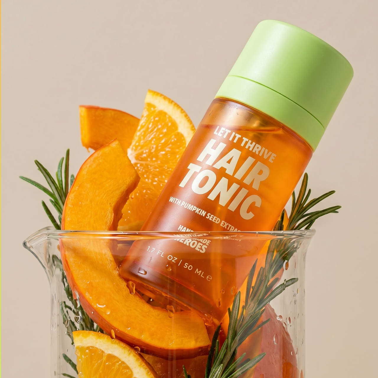 Natural hair tonic with rosemary supporting the look of fuller, thicker hair